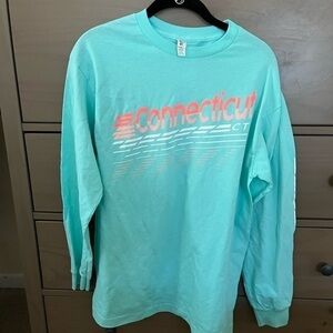 NWT Allstyle Connecticut LS blue tunic T-shirt. From BDL airport in Hartford.